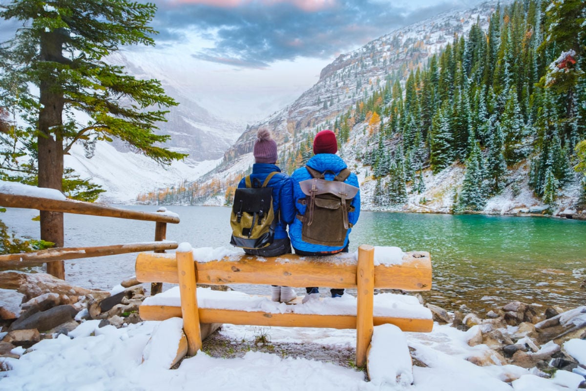 People sitting on a bench in Banff